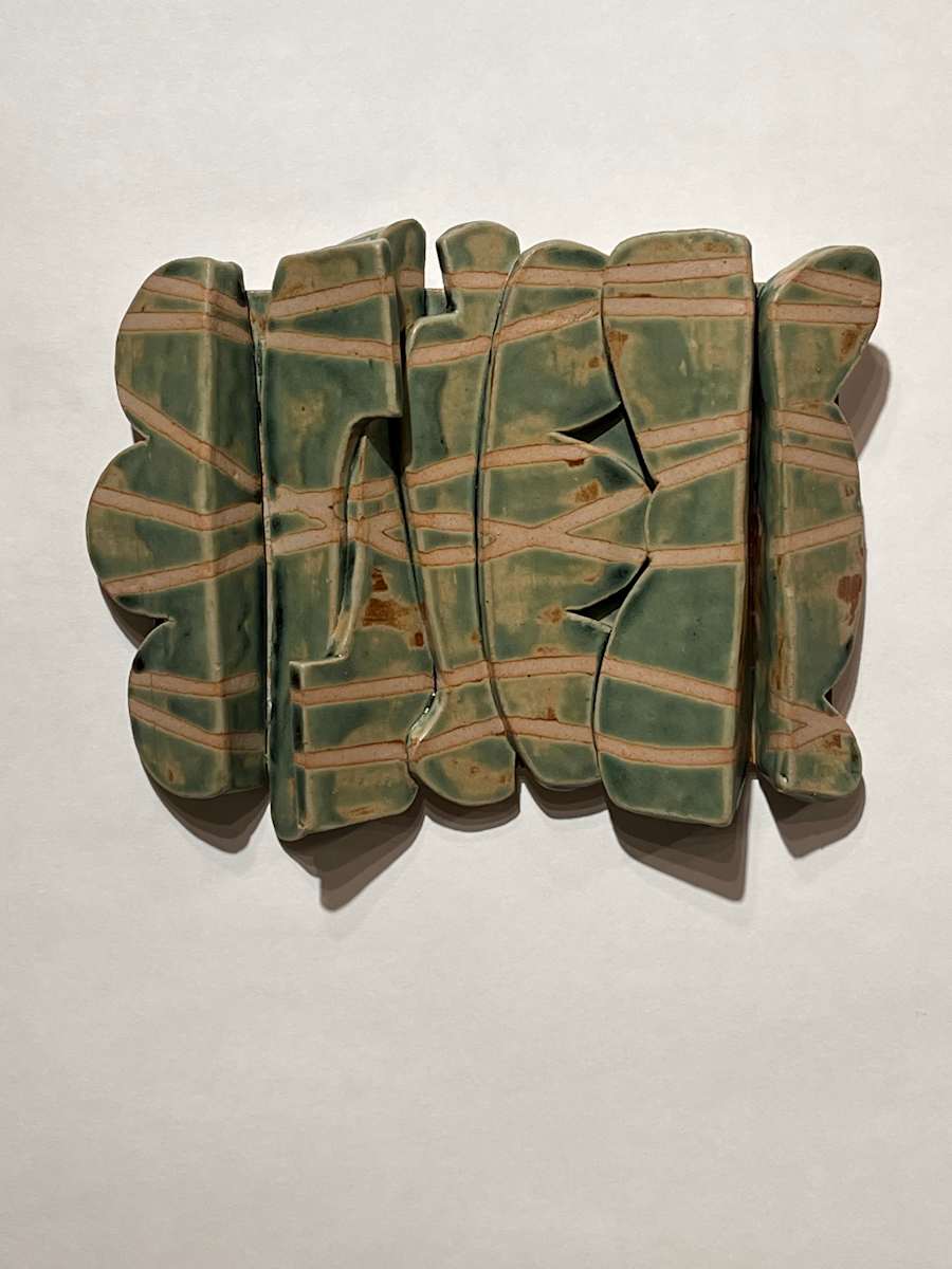 Ant Trails Under a Rock by Kate Lawless  Image: Ceramic wall piece