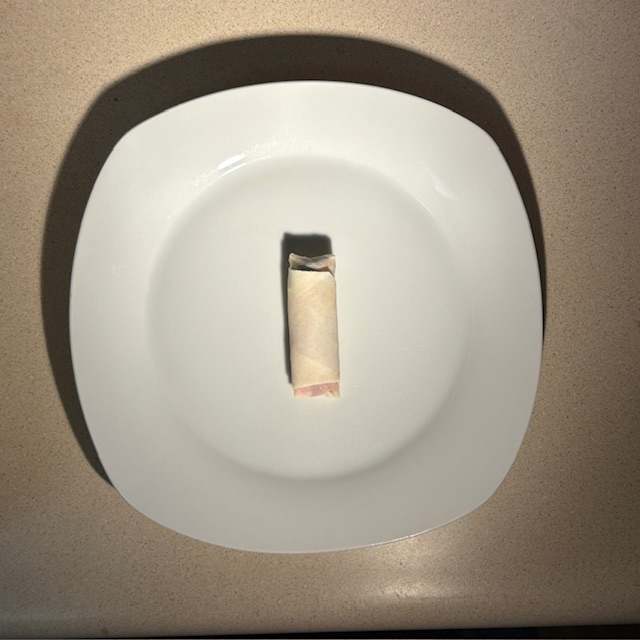 Eggrolling by Isabelle "Belle" Chau 