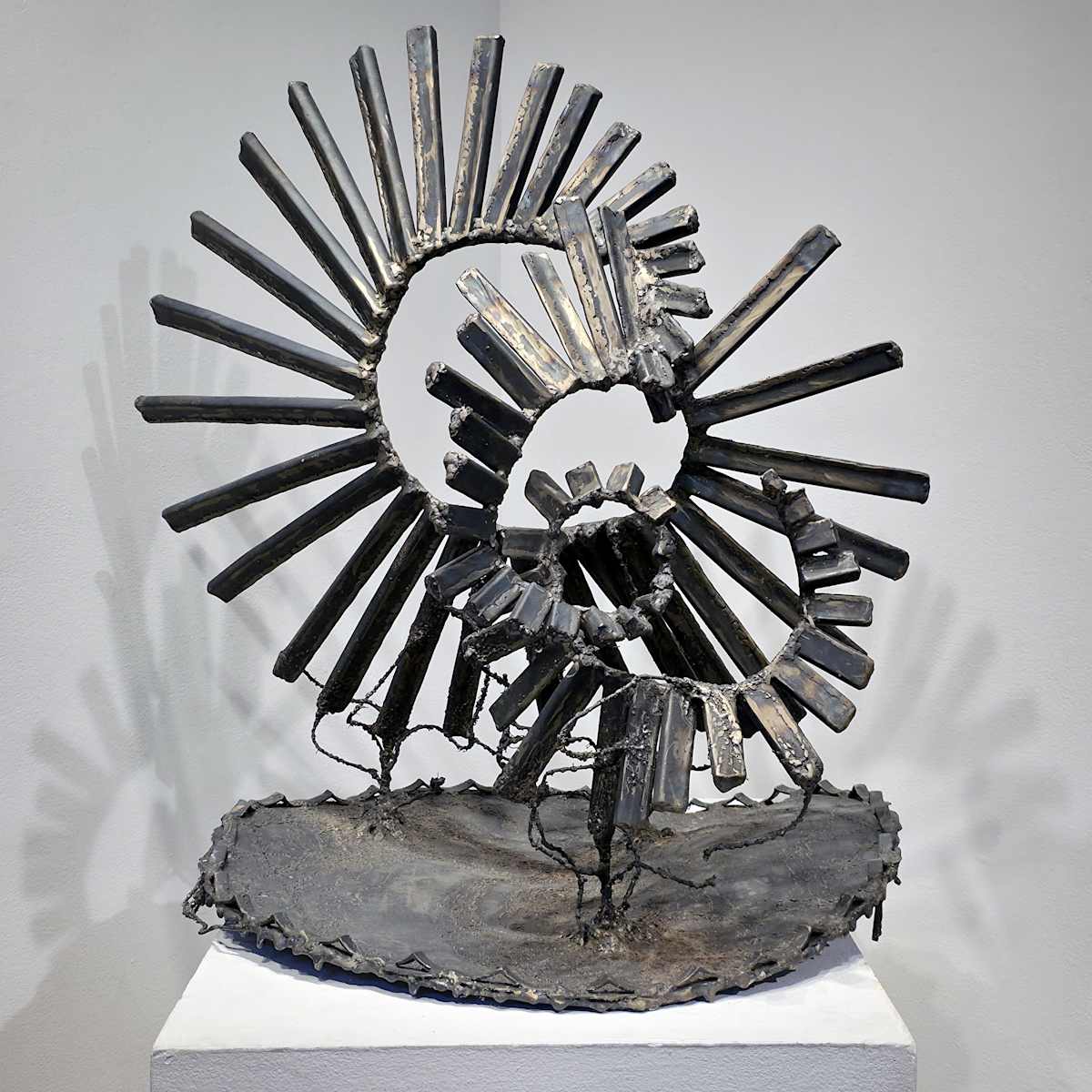 Infinite Transcendence by Tashina Marie  Image: Sparking to life from an undulating, galactic field, form ebbs in expanding and contracting spirals that intersect and twist in a dance of cyclic patterns. Representing time, matter, energy, and the cycles of life that circle round in ever changing ways. Pattern emerges as you step back from a single point along the spiral and the infinite plays before your eyes.