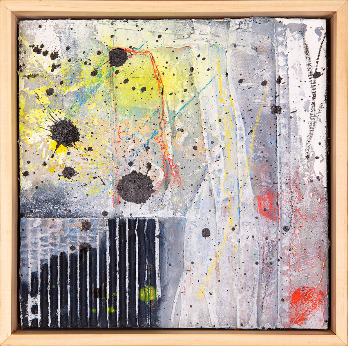 "Deconstructed #4" by Steven McHugh  Image: "Deconstructed #4," a captivating original collage painting by Madeline Island artist Steve McHugh. This one-of-a-kind piece is created on an 8" x 8" wood panel, combining fabric, canvas, and cardboard to bring depth and texture to the artwork. The use of mixed media, including spray paint, oil and cold wax paint, crayon, and graphite, results in a dynamic composition with a combination of thick paint and paint splatters that are sure to captivate any viewer. Whether displayed on its own or as a grouping of a collection, "Deconstructed #4" is a unique and striking addition to any art enthusiast's collection. Immerse yourself in the creativity of Steve McHugh with this stunning piece.

This  abstract painting characterized by a dynamic mix of colors, textures, and patterns. The piece predominantly features a blend of light hues like yellow, grey, and white, with splashes of blue, red, and black. 

Large black splatters and bold lines (cardboard) add contrast and focal points within the composition. An array of small, scattered black dots is distributed throughout the work, providing a sense of movement and energy. Vertical black and white lines in the lower left corner create a striking geometric pattern, adding to the diversity of textures.

The overall aesthetic gives off a spontaneous, almost chaotic vibe, punctuated by organized linear elements, making it a captivating piece of abstract art. Framed in natural finished gallery wood floating frame.