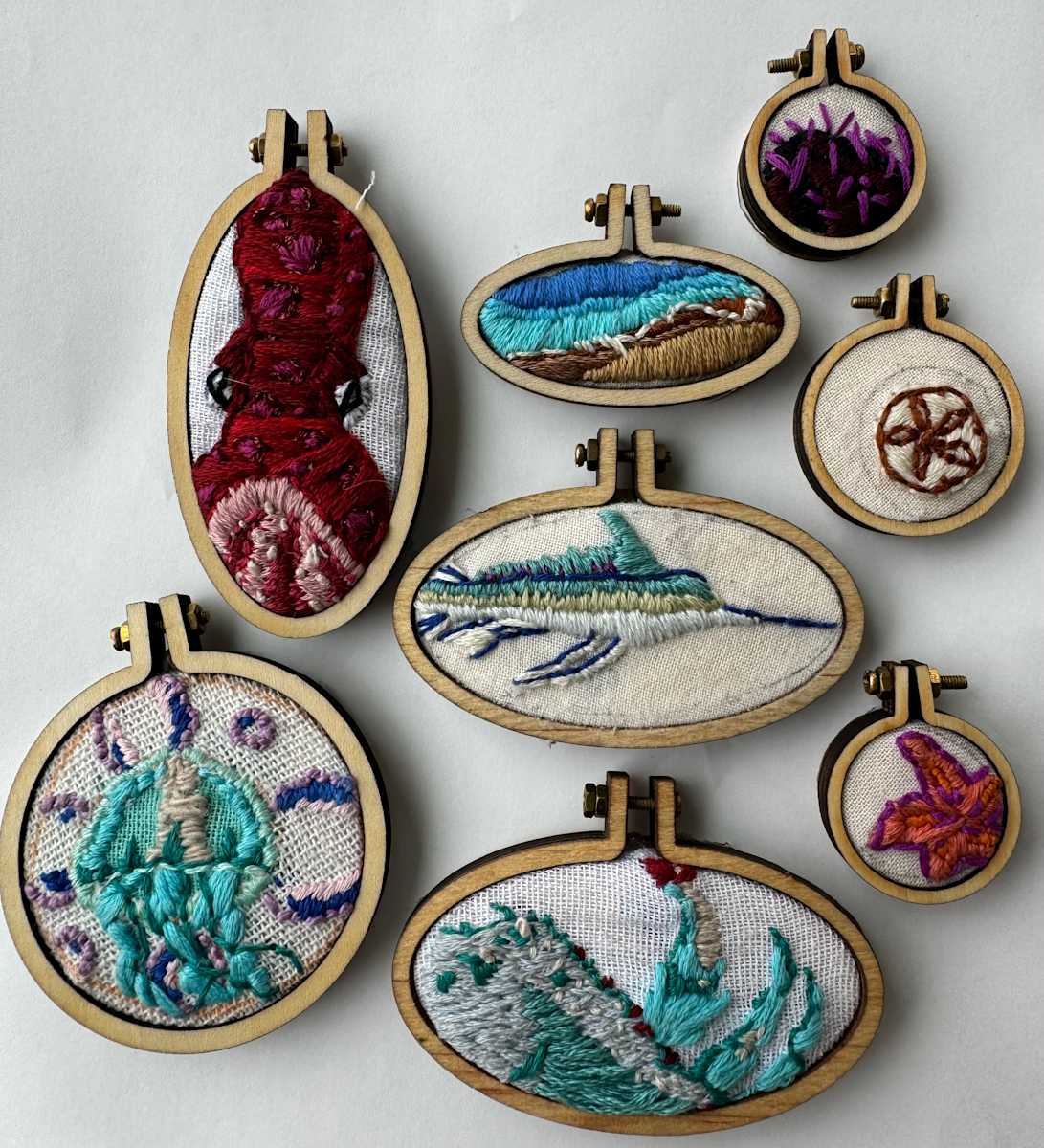 Threaded Oceanscpe by Stephanie Kuczma  Image: Hand embroidery thread art of sea life. 