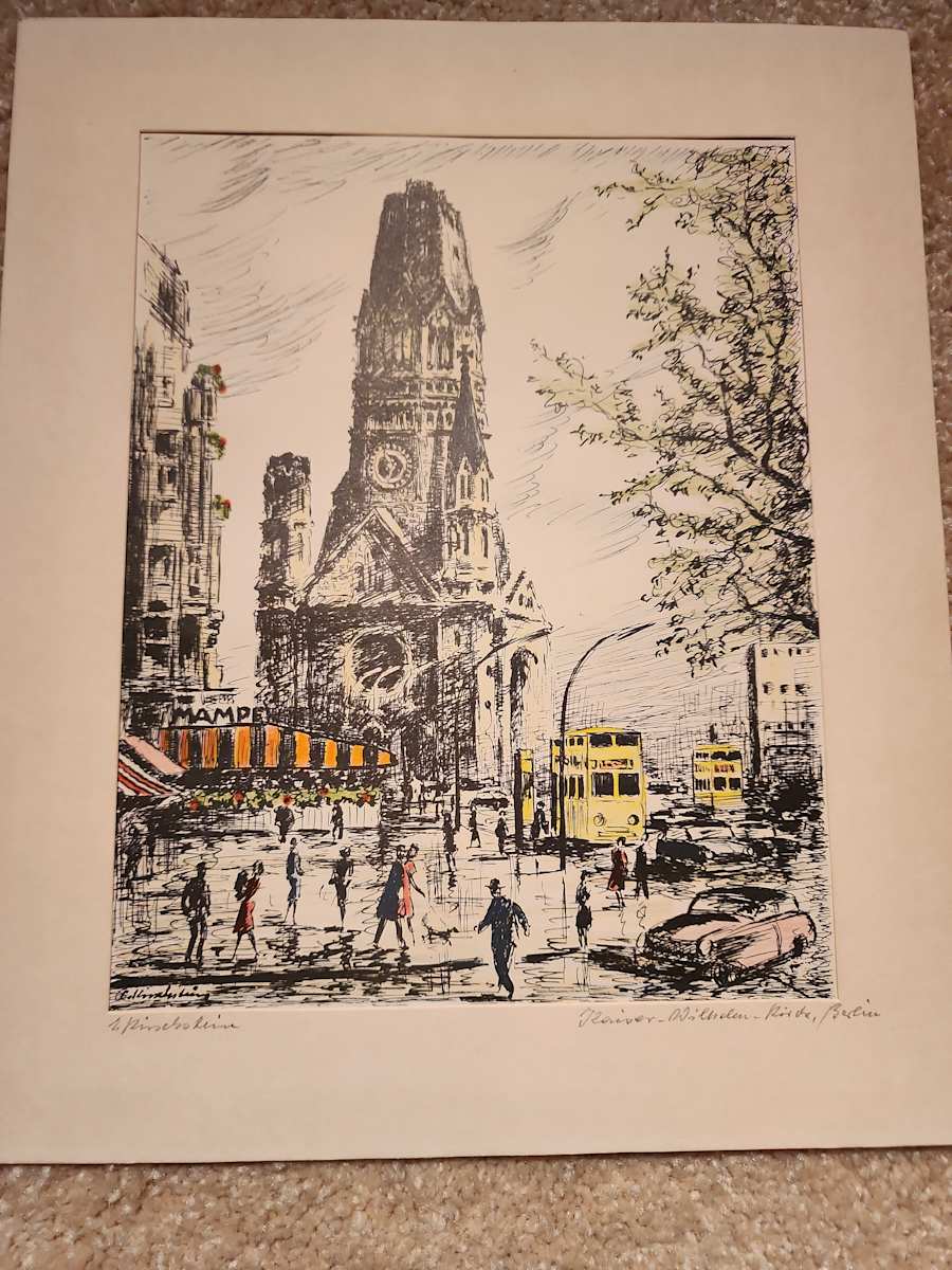Kaiser-Wilhelm-Kirche, Berlin by Erhard Kirschstein  Image: Erhard Kirschstein
Kaiser-Wilhelm-Kirche, Berlin
c. late 1940s–early 1950s
Hand-colored lithograph on paper
In this work, Kirschstein depicts the bomb-damaged Kaiser-Wilhelm-Kirche before the construction of its modern postwar additions. Rather than isolating the ruin as a memorial, he situates it within the flow of everyday city life—trams, automobiles, and pedestrians pass through the scene without pause. Kirschstein’s restrained, observational approach records Berlin as a lived city, capturing a transitional moment between destruction and later memorialization.