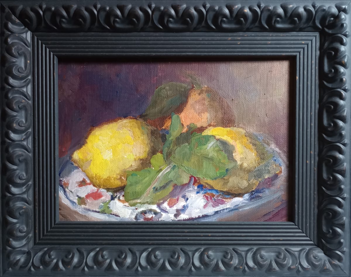 Lemon, Orange, Lemon by Karla Mulry  Image: Two lemons and an orange from a local grove sit on an Old World plate with a frame that taps into the Iberian vibe