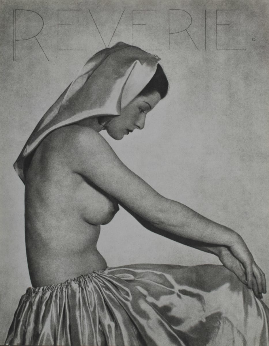 Reverie by Shirley Hall  Image: A black and white partially nude portrait of a woman sitting in side profile. She is wearing a silk handkerchief over her hair and a silk dress. Above her on the top edge of the image is the word "REVERIE". 