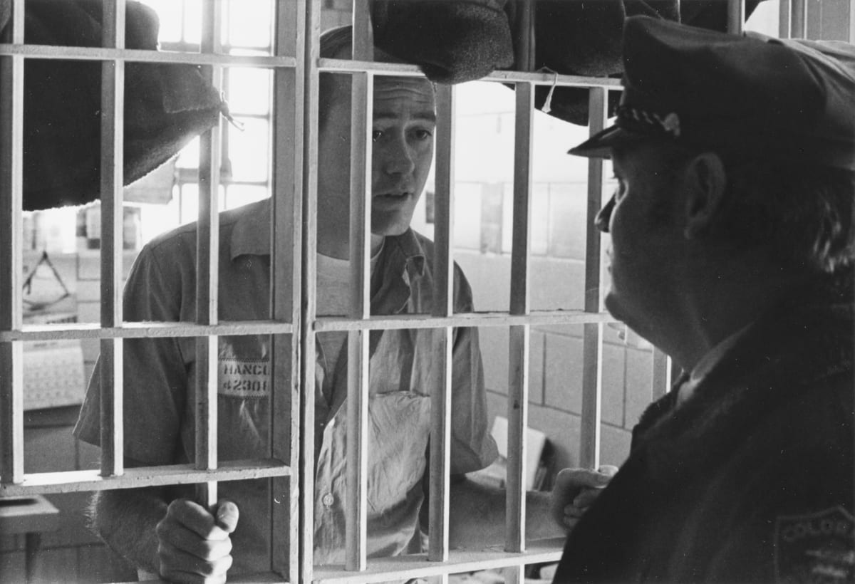 Inmate and Guard, Death Row, Cell House #3 Cañon City by Charles McNamara 