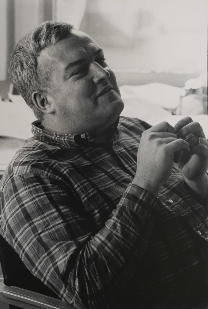Physicist Lundt by H. Landshoff  Image: A black and white portrait of a man in a plaid shirt.