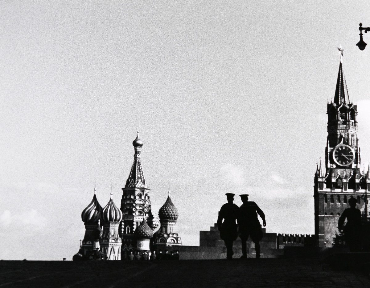 Moscow, Russia Red Square, Spasskaya Clock Tower, St. Basil Cathedral by Edward R. Miller  Image: Silhouette of two soldiers facing away from camera towards St. Basil Cathedral