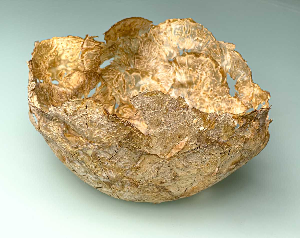 Burned celery artichoke vessel by Annette Holtkamp 