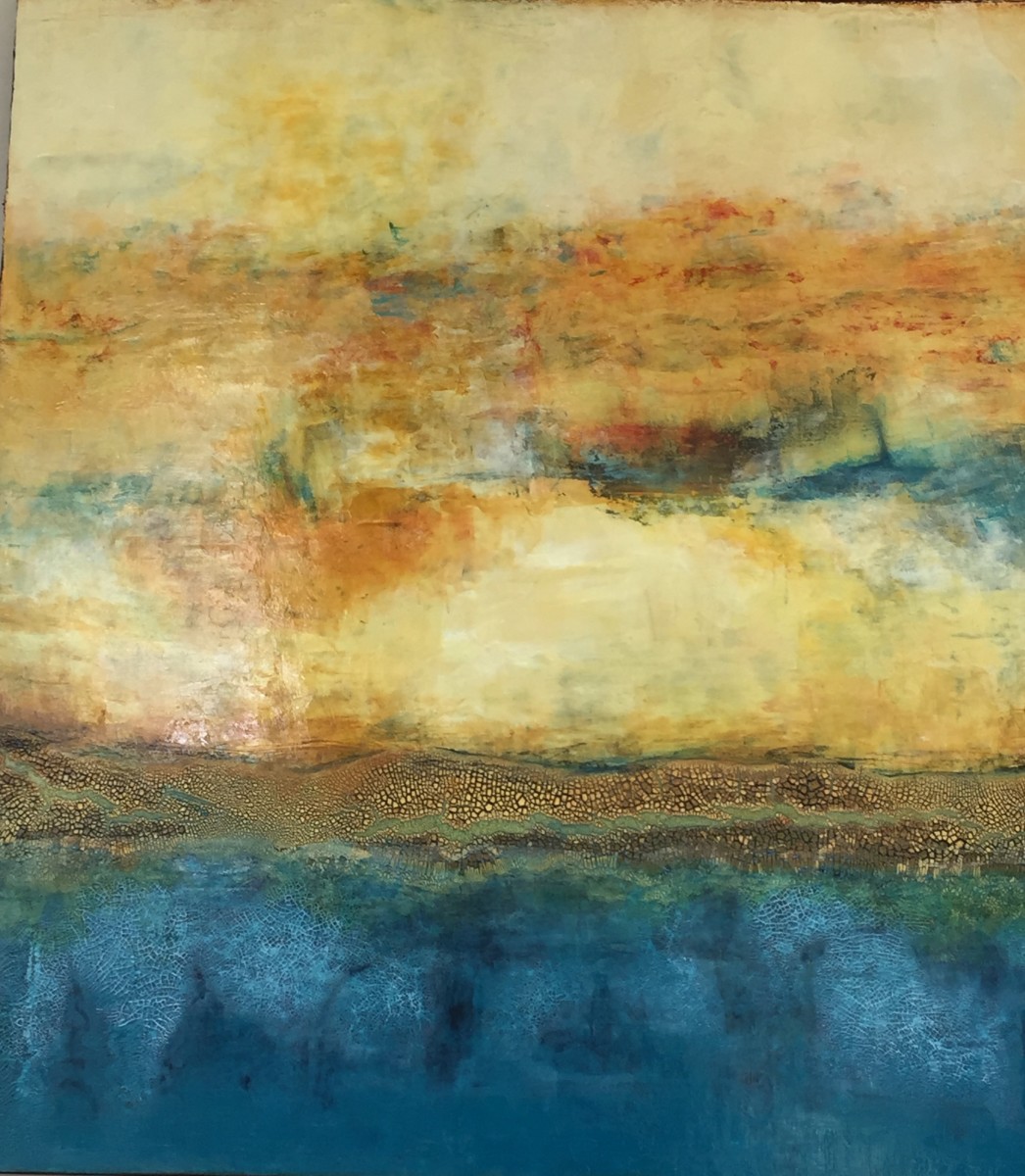 Sunset amongst the rocks on the beach by Lisa TEAR 