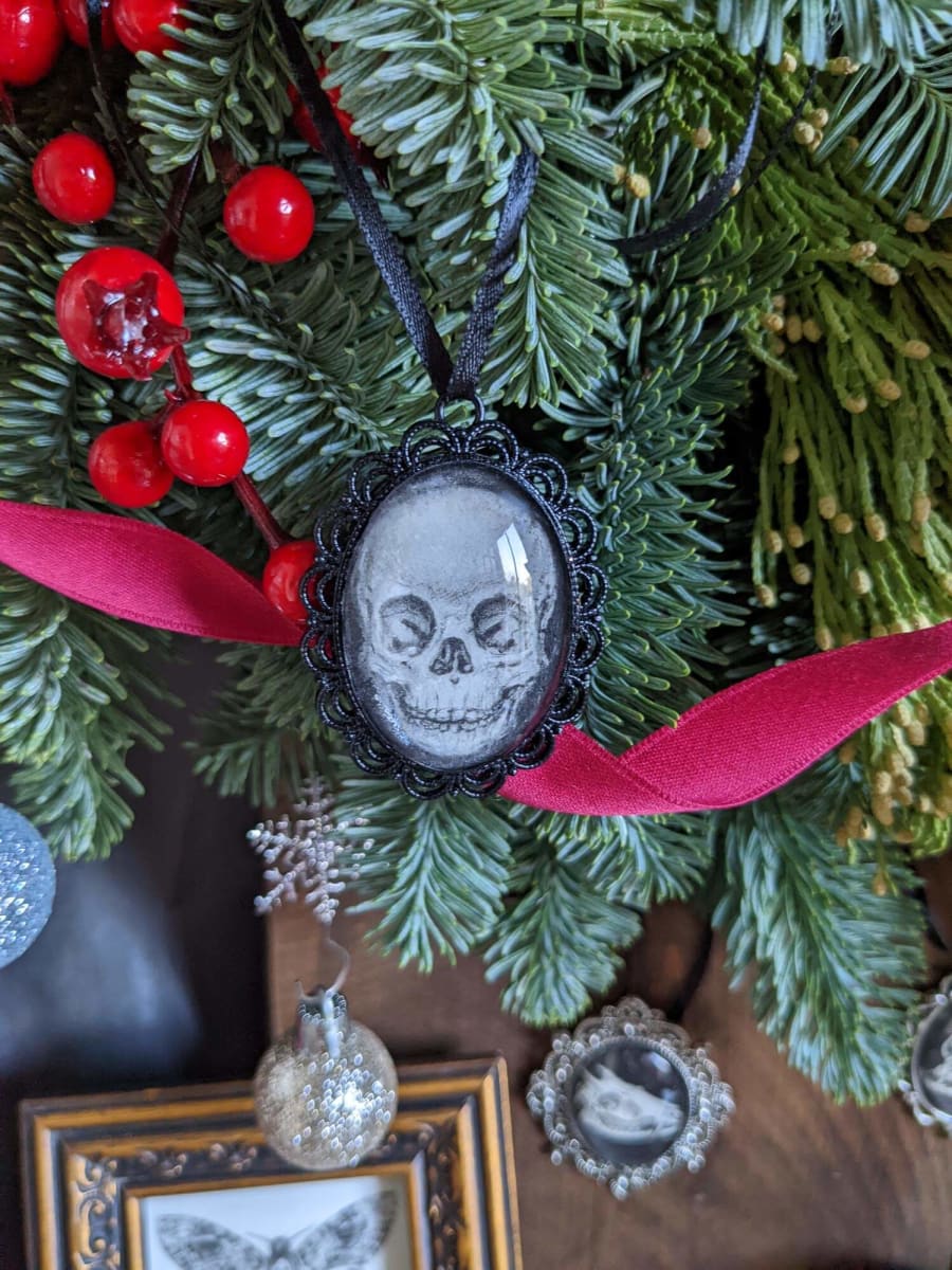 Human Child Skull - Black Metal & Glass Original Art Ornament by Layil Umbralux 
