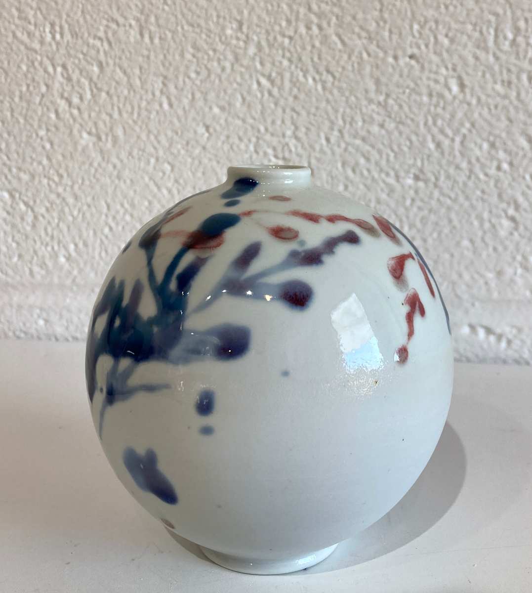 Porcelain - Small round vessel with multicolor leaves by Cali Almy , Image 1.