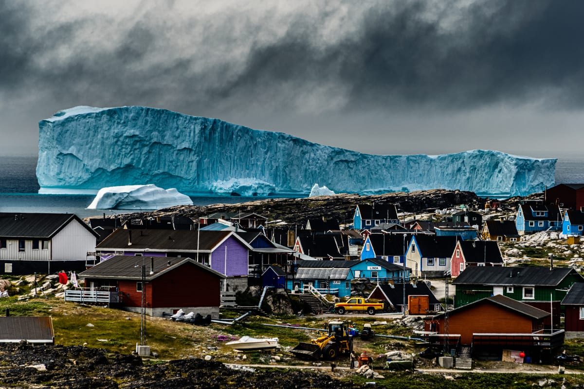 Massive Iceberg Looming Over Qeqertarsuaq, Qeqertarsuaq, Greenland by Stephen Gorman 