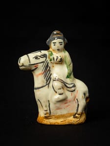 Untitled (Chinese Porcelain Figurine of a Horse and Rider) by Artist Unknown 