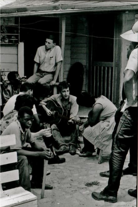 Bob Dylan behind the SNCC office. Greenwood, Mississippi. 1963. by Danny Lyon 