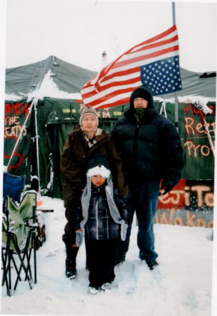 Camp Family in Protest, Standing Rock, Winter, Oceti Sakowin Camp at Standing Rock Reservation. 2016 by Kilii Yuyan 