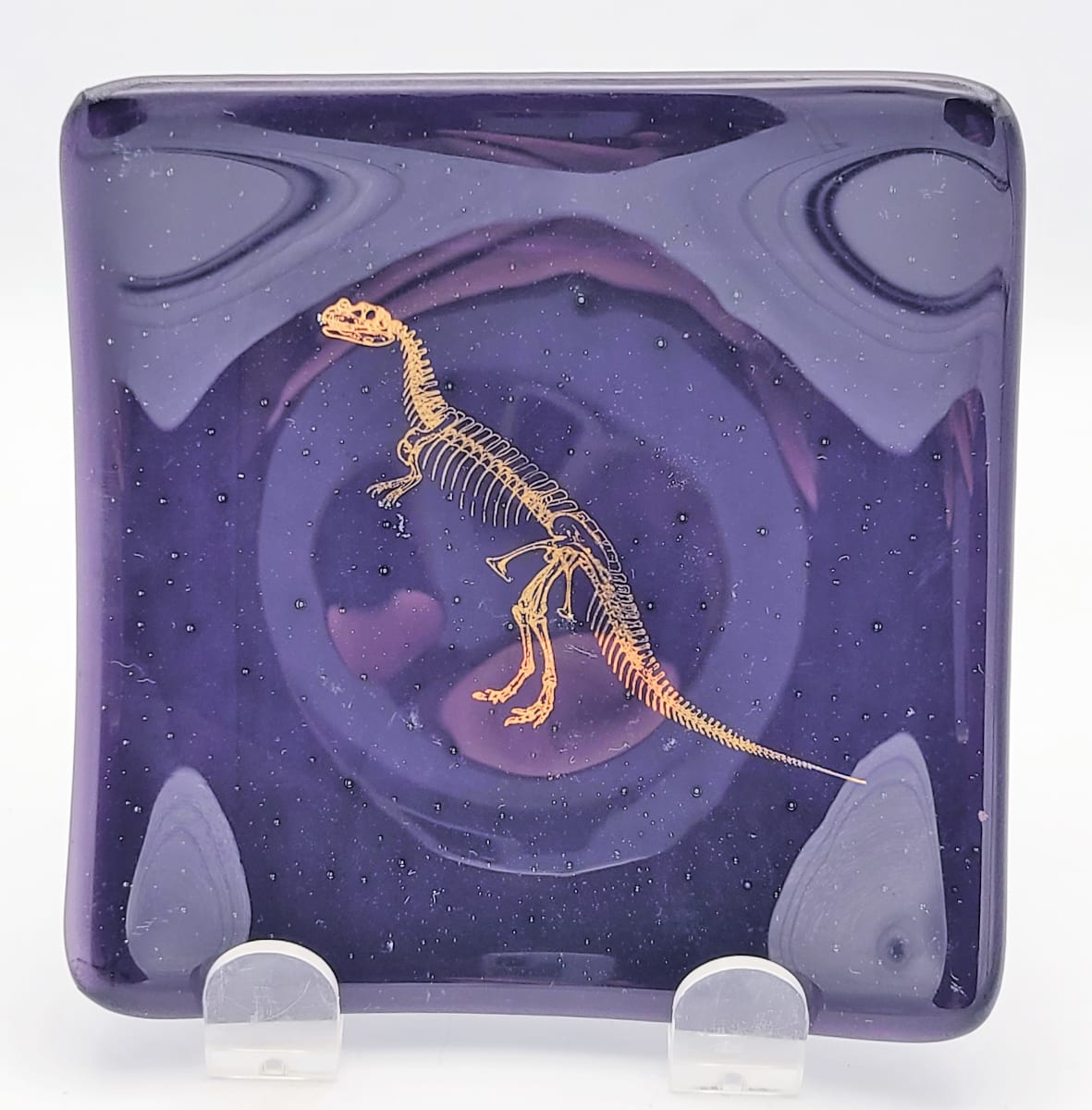 Plate-Purple with Ceratosaurus Skeleton by Kathy Kollenburn 