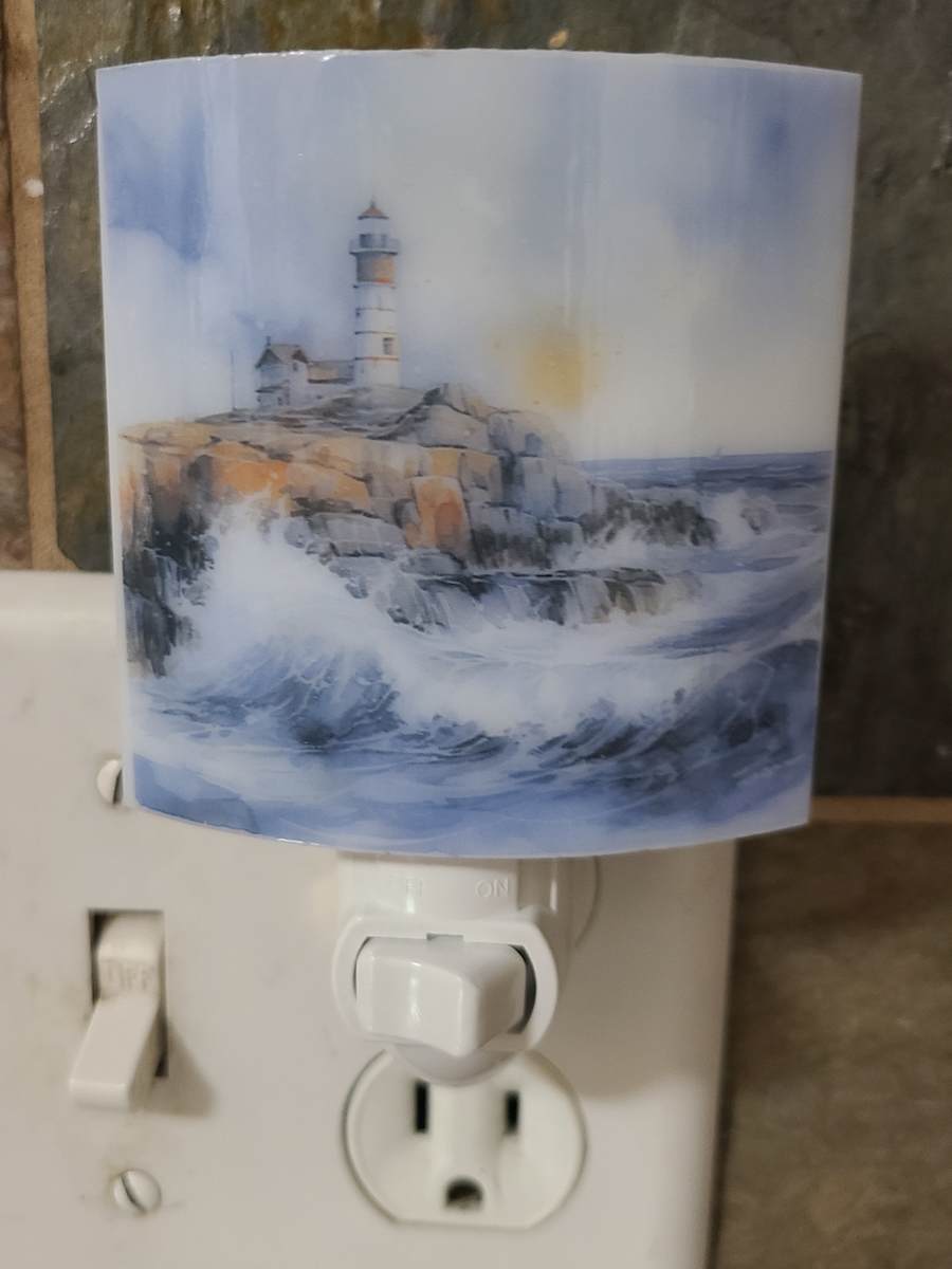Nightlight-Lighthouse on Rocks by Kathy Kollenburn 