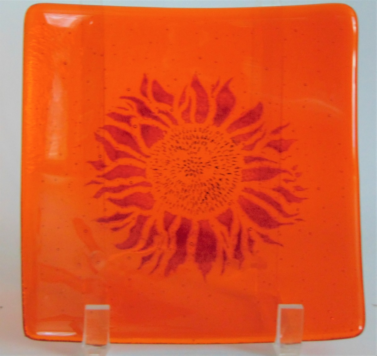 Plate-Red sunflower on orange by Kathy Kollenburn 