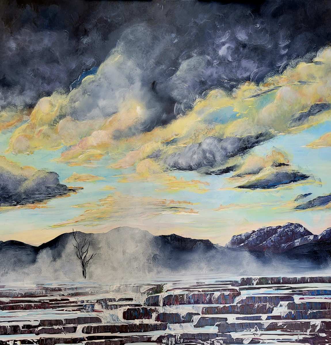 Spring Dawn at the Thermals by M Shane  Image: Morning of a spring storm the clouds begin to pick up light and move through the landscape. Cool temperatures raise the mist from the thermal pools to new heights. Softening the landscape and providing a peak into the dawn of time.