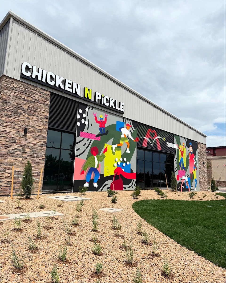 Brightly colored mural on the outside of a building