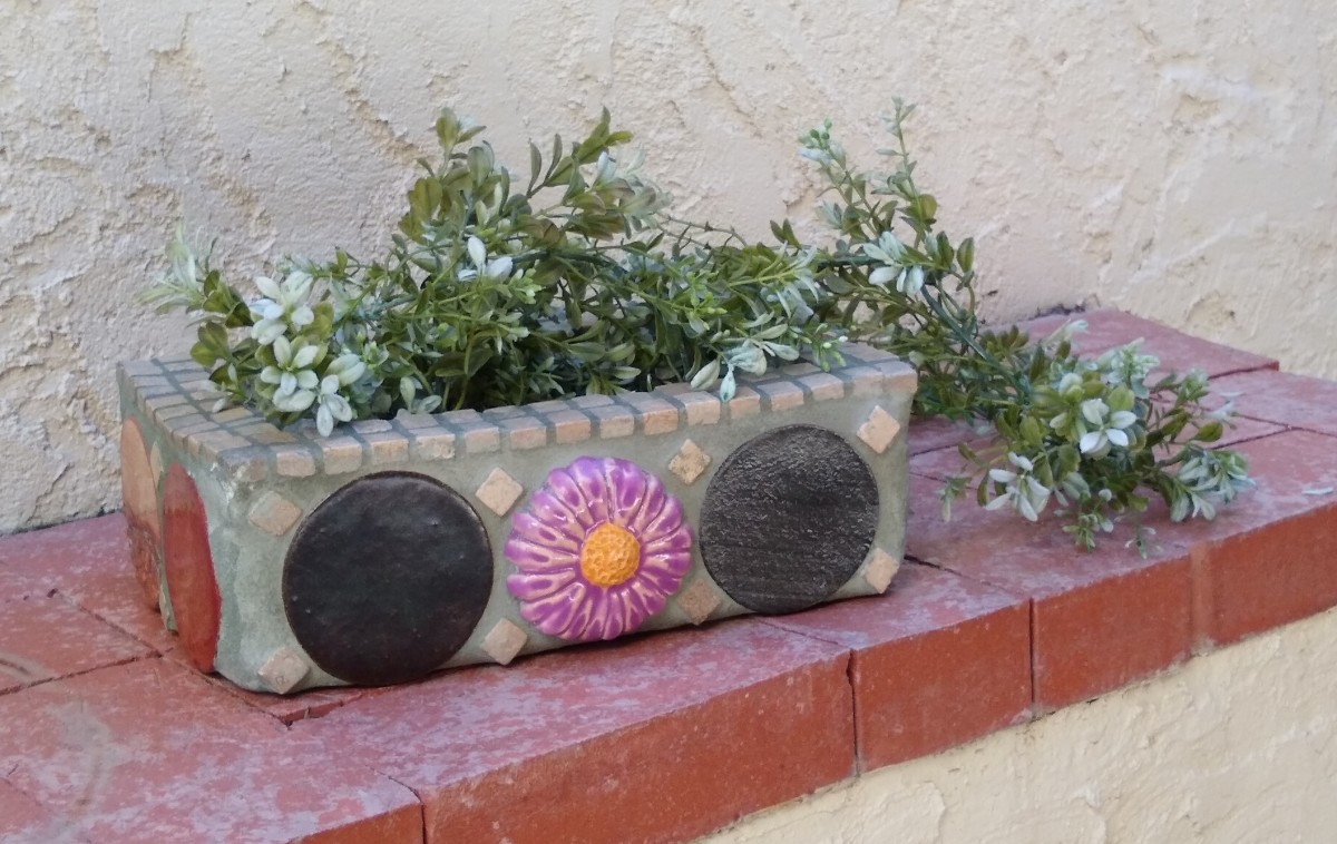 Flower Spot (planter/door stop) by Andrea L Edmundson 