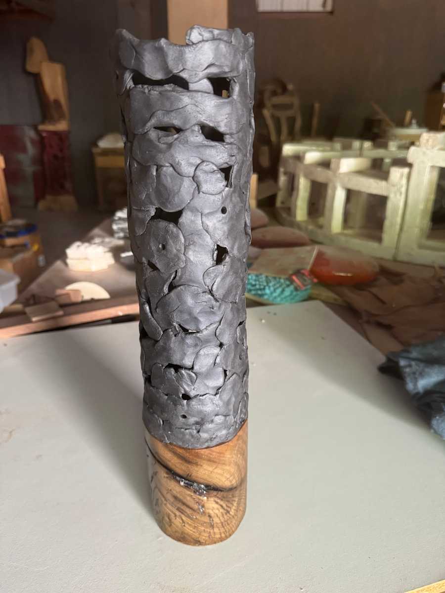 Small round black vase by Brandon Reese 