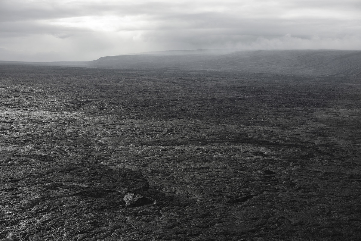 A Scenic View, growing land (lava field aerial veduta) by Wawi Navarroza 