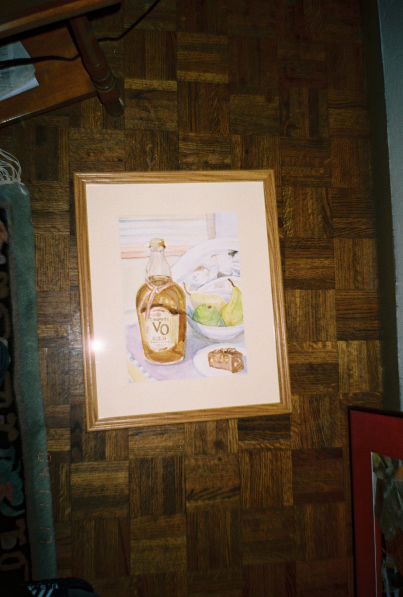 Still Life with fruits, brownie and a whiskey bottle by Gallina Todorova 