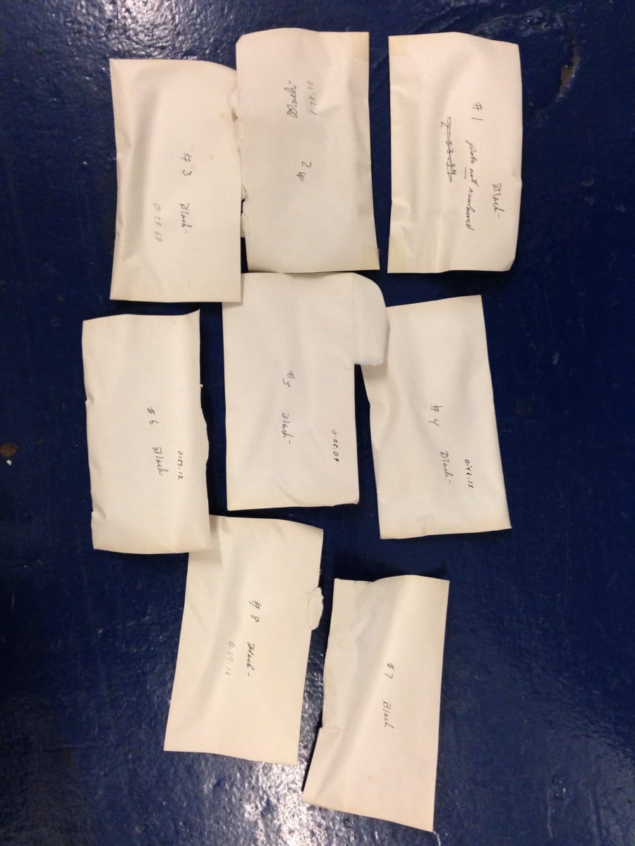 Untitled (envelopes with hourglasses) by David Nelson  