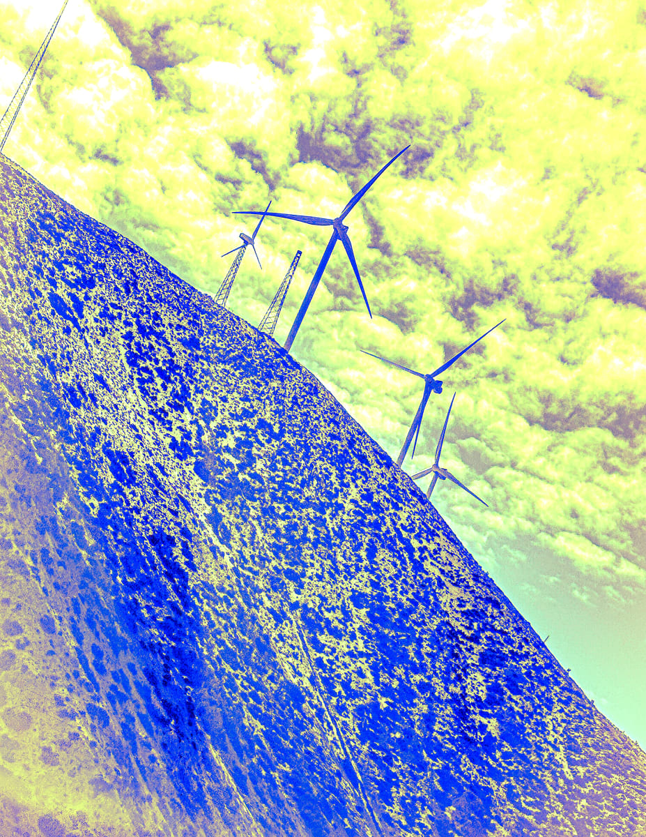 Moonscape by Barbara Jacobs  Image: An eerie view of wind machines on a hillside. Southwest US.