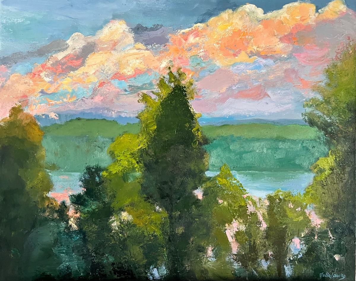 The Forest Through The Trees by Julia Chandler Lawing  Image: Mountain lake view through there trees at sunset