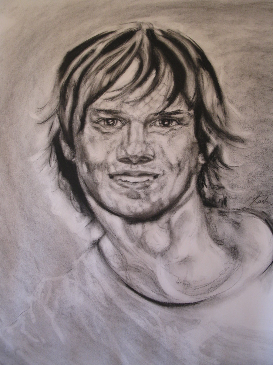 b) Kyle by Kathleen Tonnesen  Image: "Kyle" Charcoal Drawing © Kathleen Tonnesen, 2009.