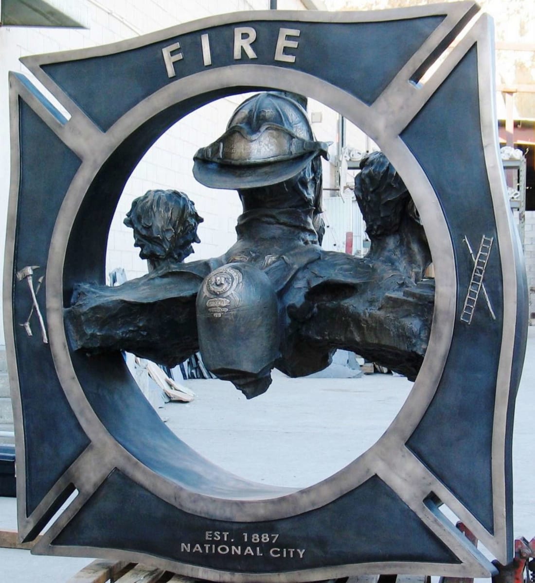 Relief work on NCFD sculpture by Richard Becker 