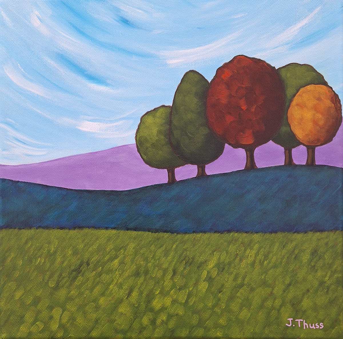 The Foothills by Jane Thuss  Image: Colourful trees on the edge of the purple and blue foothills.