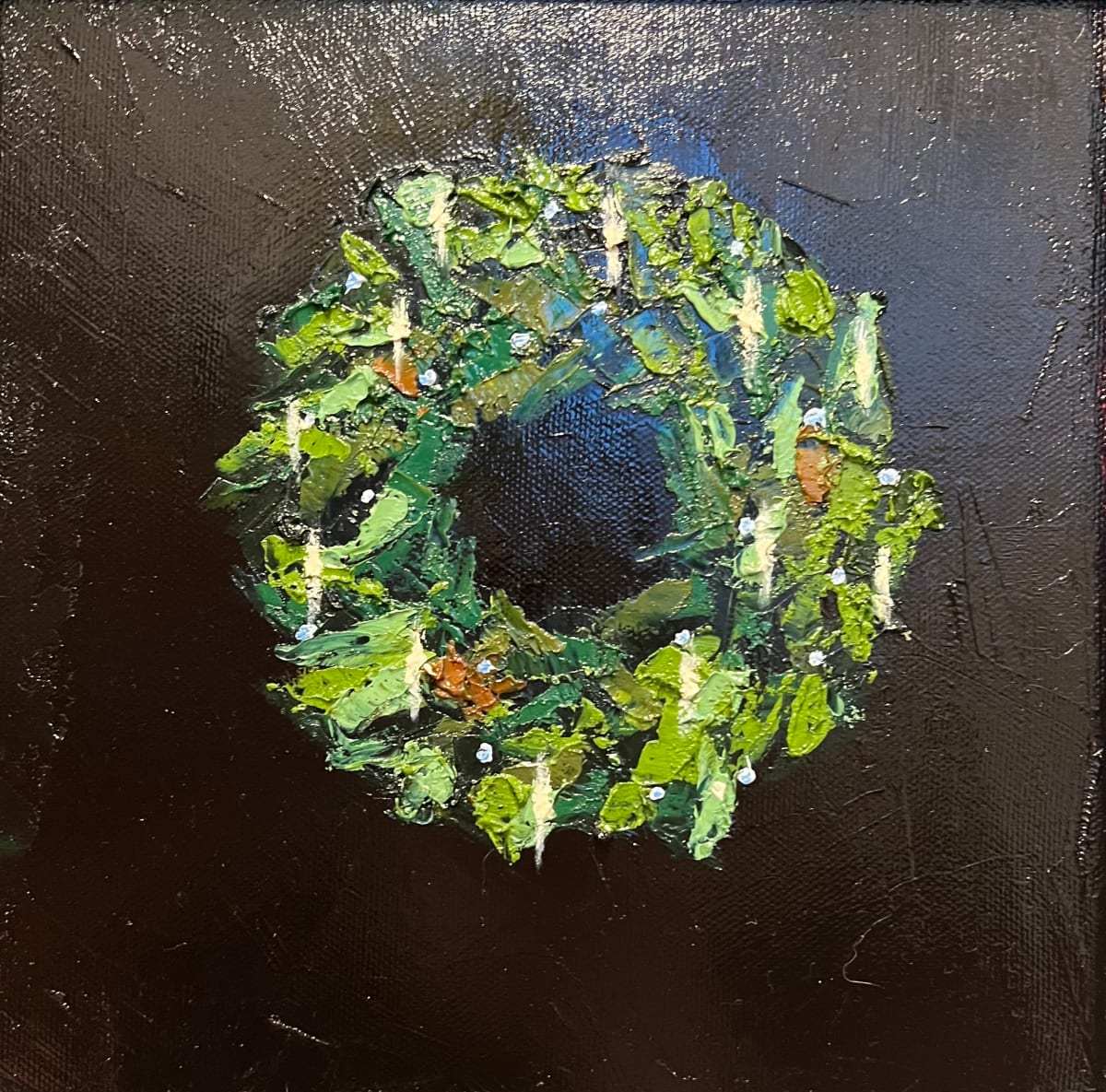 Wreath 1 by Mary Kamerer Impressionist Painting  Image: As if set against the stillness of a winter’s night, this wreath is textured oil paint against a nearly-black palette knife background. Shades of green form a simple, natural wreath with only the sparkle of white lights illuminating from among the branches. Painted on canvas, this artwork is framed in a black wood museum-style frame and is wired and ready to hang. Limited edition of four.