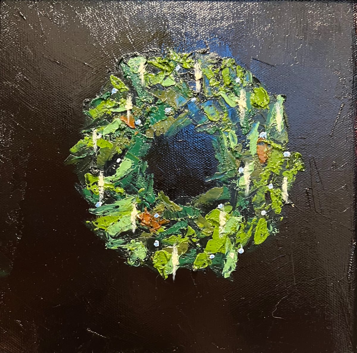 Wreath 1 by Mary Kamerer Impressionist Painting  Image: As if set against the stillness of a winter’s night, this wreath is textured oil paint against a nearly-black palette knife background. Shades of green form a simple, natural wreath with only the sparkle of white lights illuminating from among the branches. Painted on canvas, this artwork is framed in a black wood museum-style frame and is wired and ready to hang. Limited edition of four.