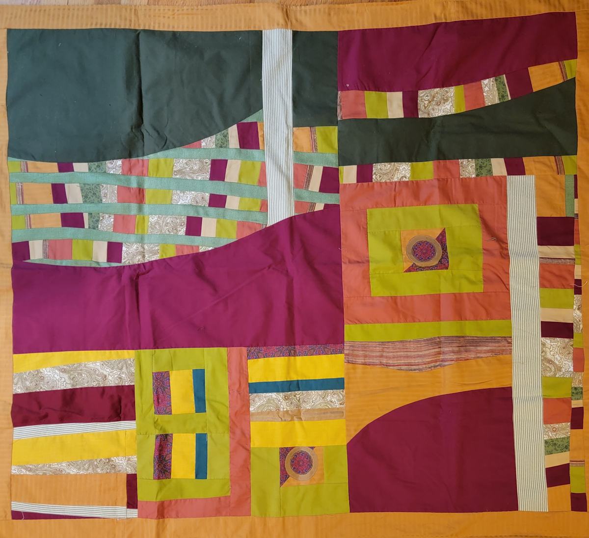 Fabric Collage Improv with two circles by Jude Barton, Image 1.