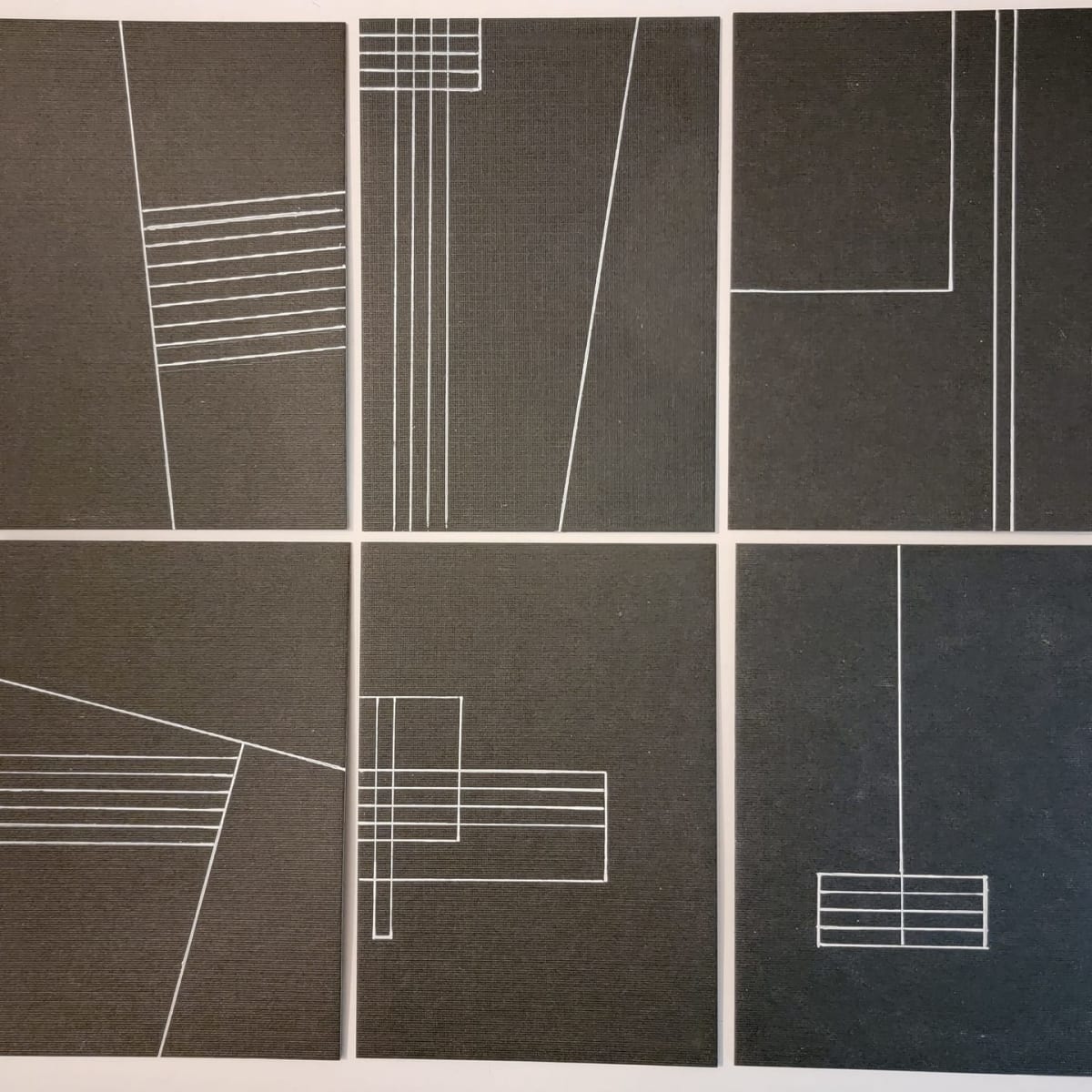 Lines on 6 Black Panels by Jude Barton 