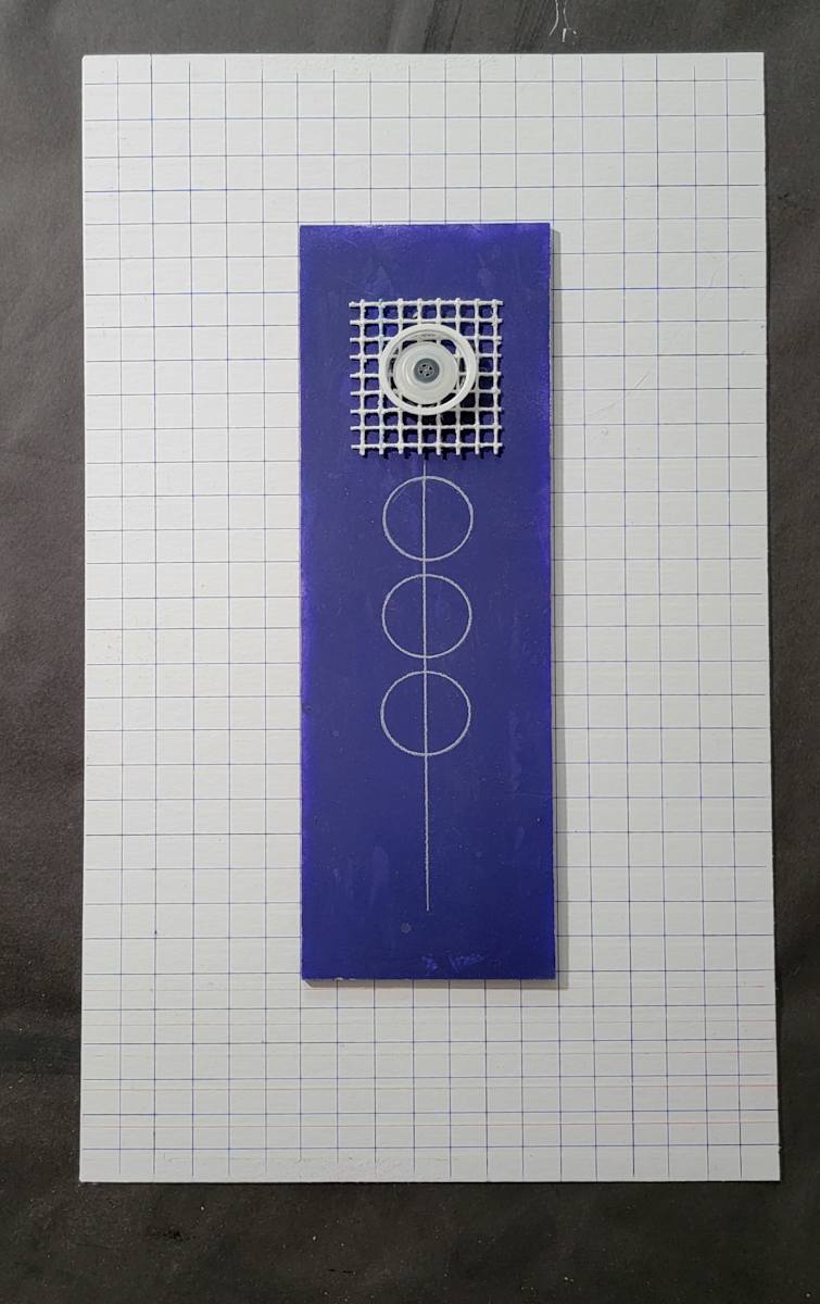 white grid with three circles on a blue background by Jude Barton 