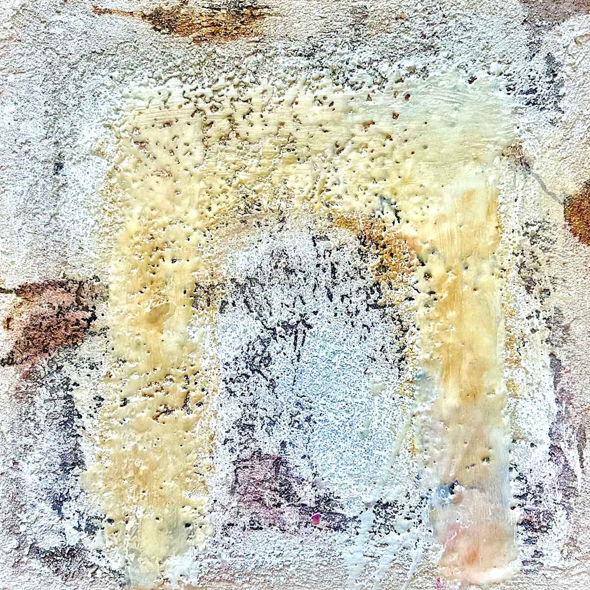 Safe Place by Catherine  Mansell  Image: This artwork features a textured, abstract composition with an overall muted, earthy palette. Dominated by shades of beige, white, and light yellow, the surface displays an intricate pattern of raised, granular details. There are subtle hints of grey and brown interspersed throughout the piece, adding depth and contrast. The artwork has an organic, almost weathered appearance, evoking a sense of age and natural erosion. The central area suggests a focal point with more concentrated texture and color variation, drawing the viewer's eye inward. The edges of the piece are softer, blending into the background