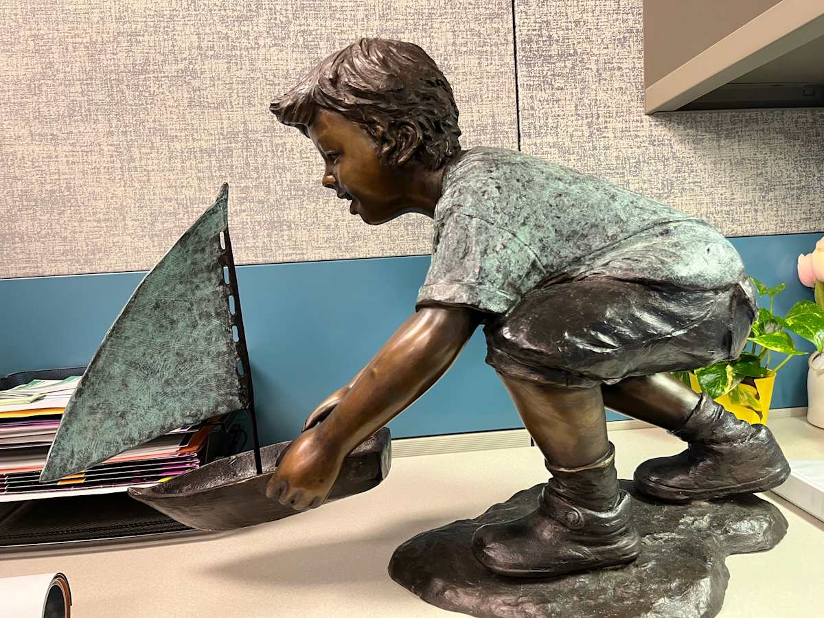 Boy and Sail Boat Sculpture 
