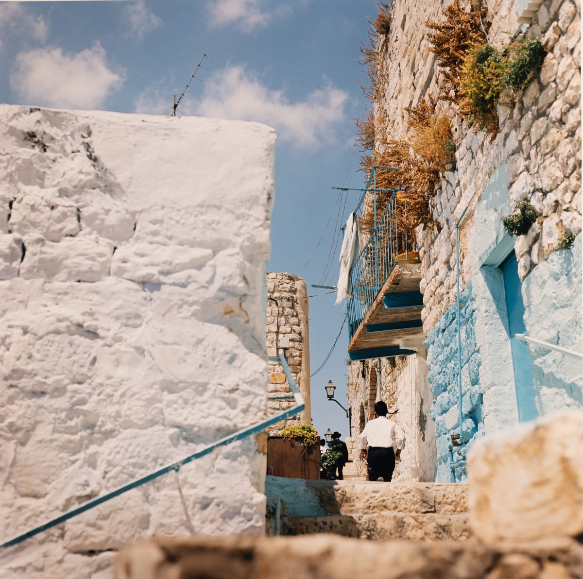 Boy Ascending Stairs (Tzfat, Israel) by Amie Potsic 