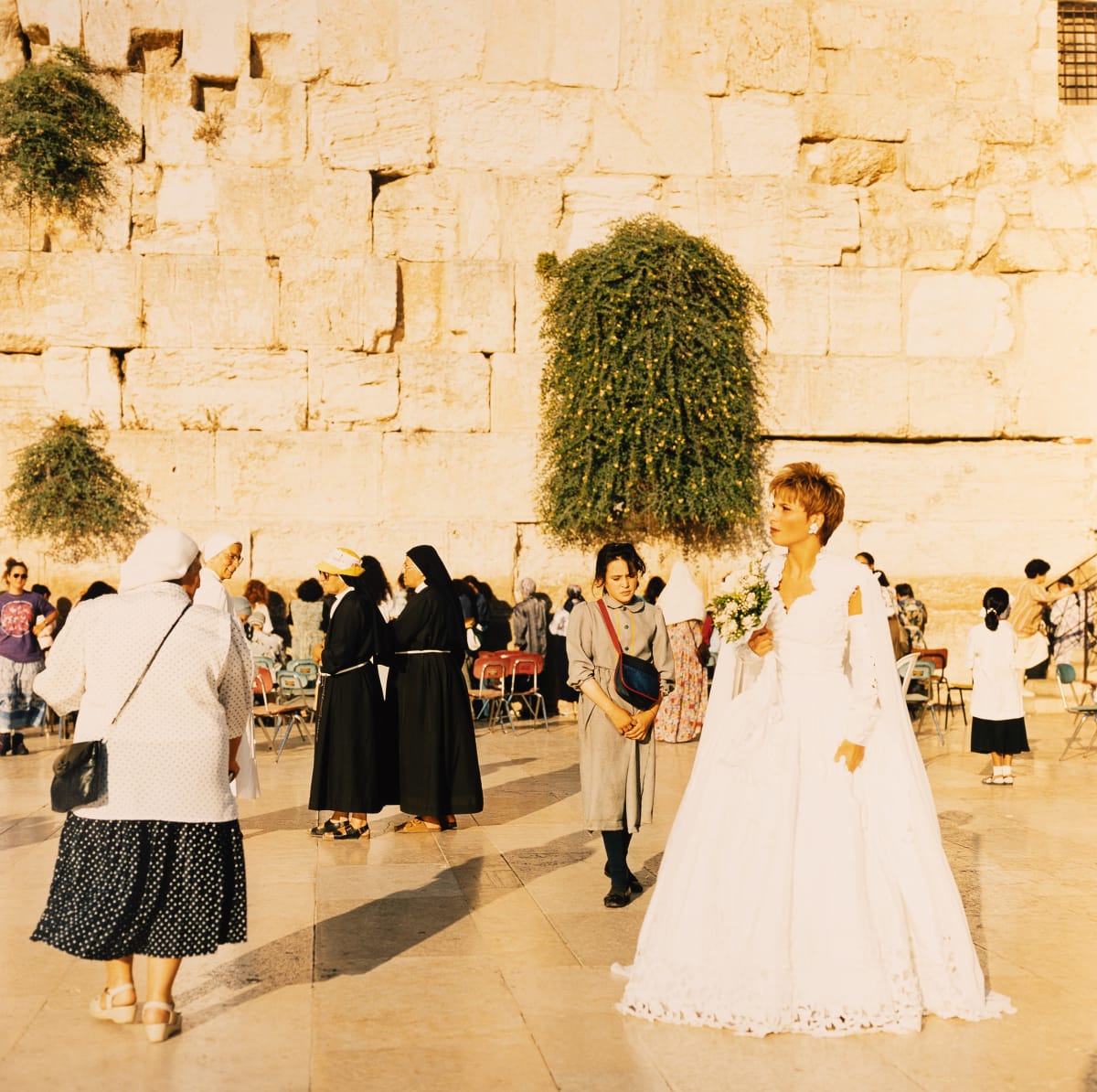 Bride at the Western Wall (Jerusalem, Israel) by Amie Potsic 