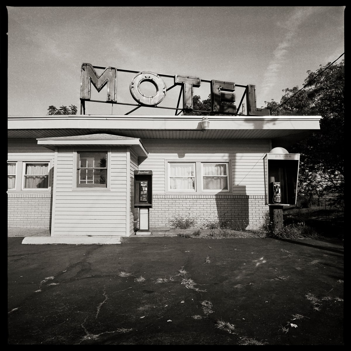 585.235.9340 & 585.235.9923 – 490 Motel, 360 Mount Read Boulevard Rochester, NY 14611 by Eric T. Kunsman, Image 1.