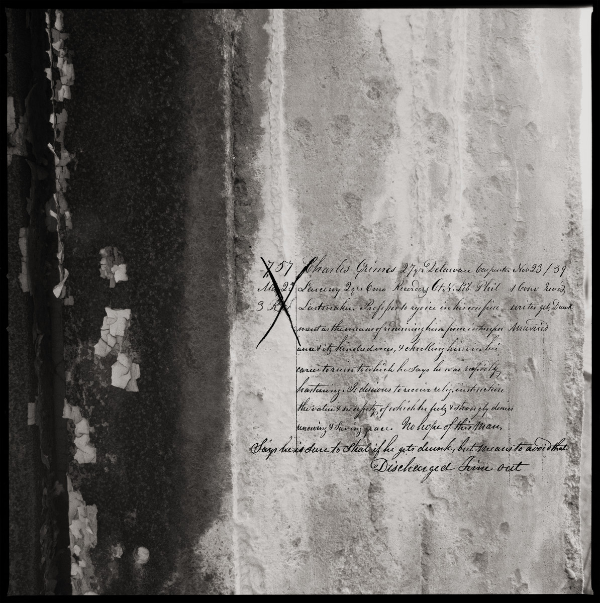 Charles Grimes by Eric T. Kunsman  Image: ID: A black and white image shows a wall with peeling paint.  In an overlay there is cursive writing detailing prisoner Charles Grimes.