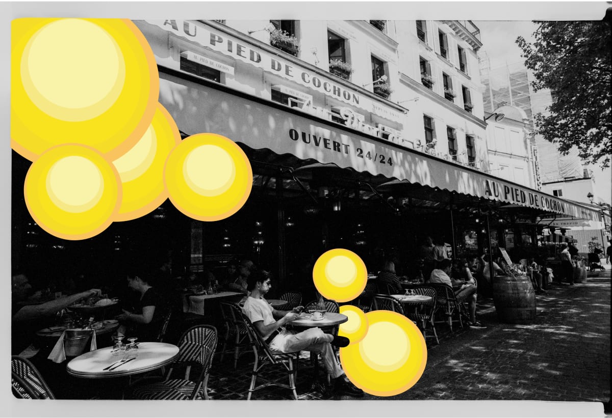 Au Pied De Cochonito by Miguel Maltos Gonzales  Image: A moment in the life of a person sitting at a cafe in Paris, France on a sunny afternoon. 
