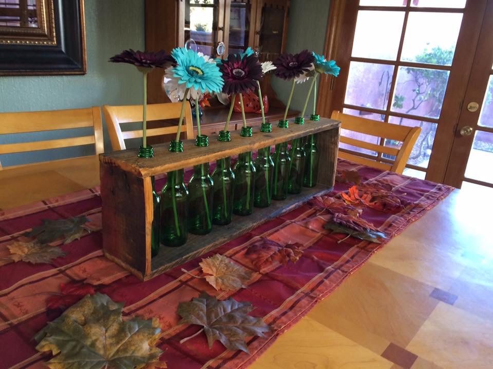 Pallet wood a bottles centerpiece by Heather Medrano 