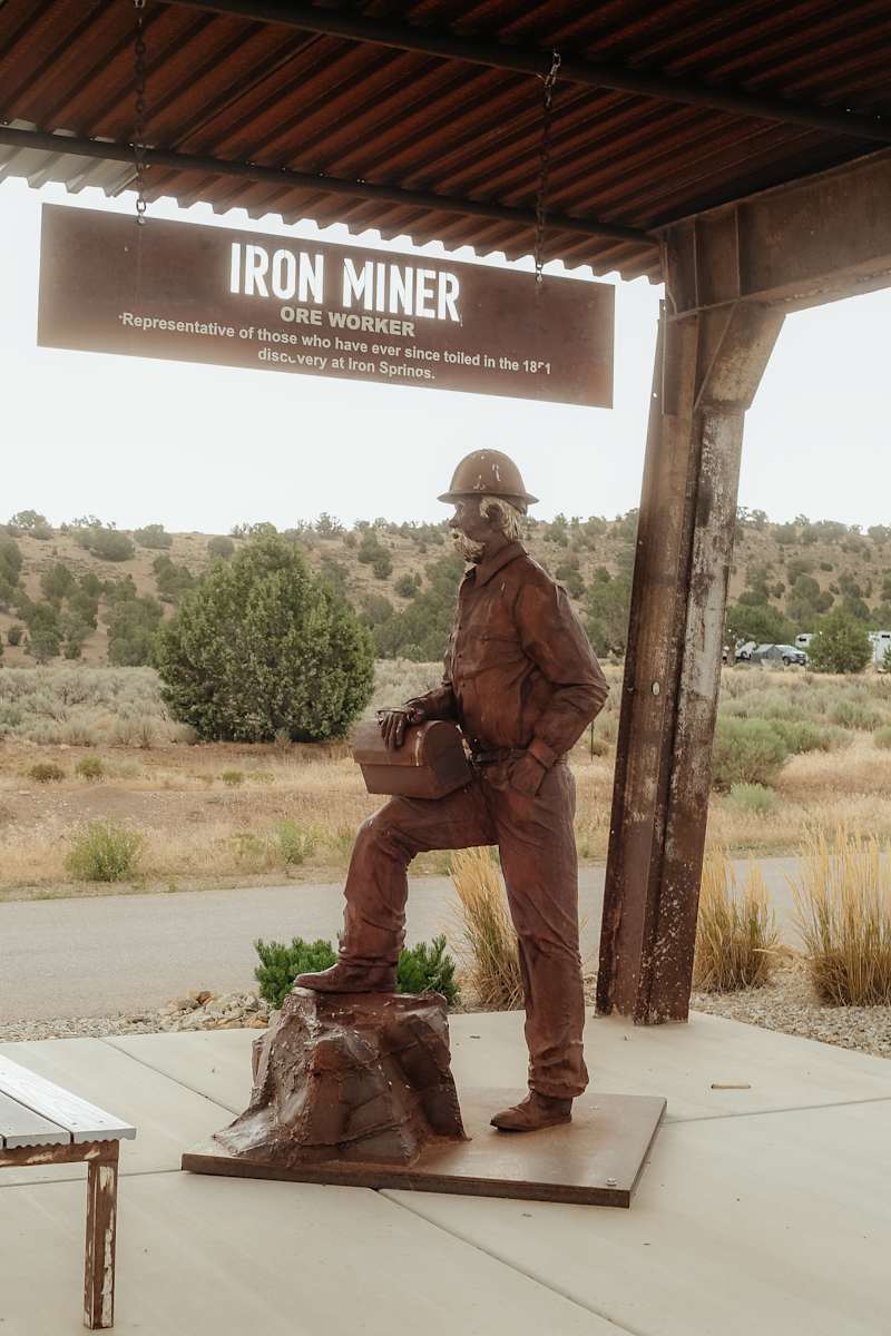 Iron Miner: Ore Worker by Jacob Dean  Image: Iron Springs RV Park, 3196 Iron Springs Road, Cedar City, UT.

Photograph by Ryann S. Ford. Licensed by Creative Commons (CC  BY-SA). 