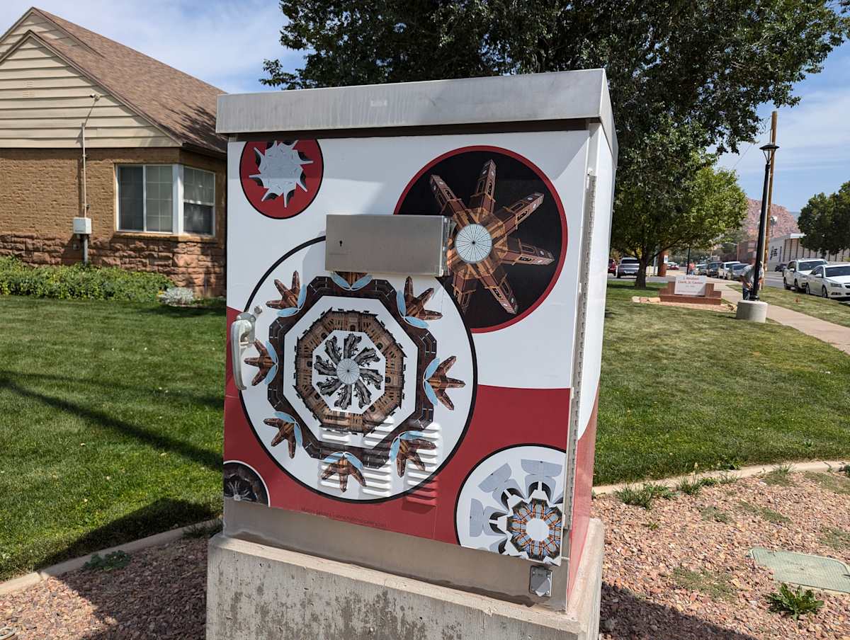Utility Box Wrap (SUU Mandala) by Mallory Sanders  Image: 300 W and University Boulevard (Center Street) Cedar City, UT. Photograph by Jacob B. Arnell. Licensed by Creative Commons (CC BY-SA).