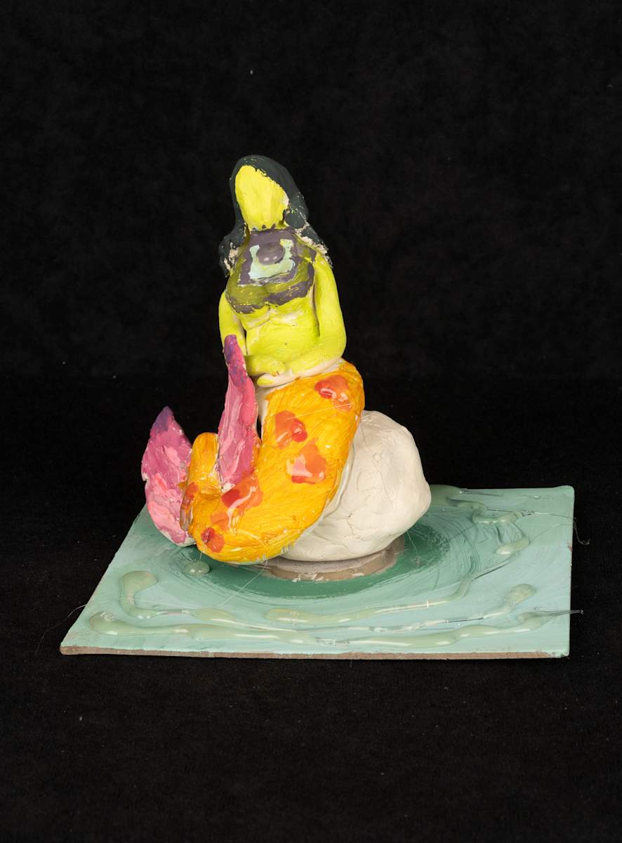 Siren on a rock by Ariel Ankrum, Image 1.